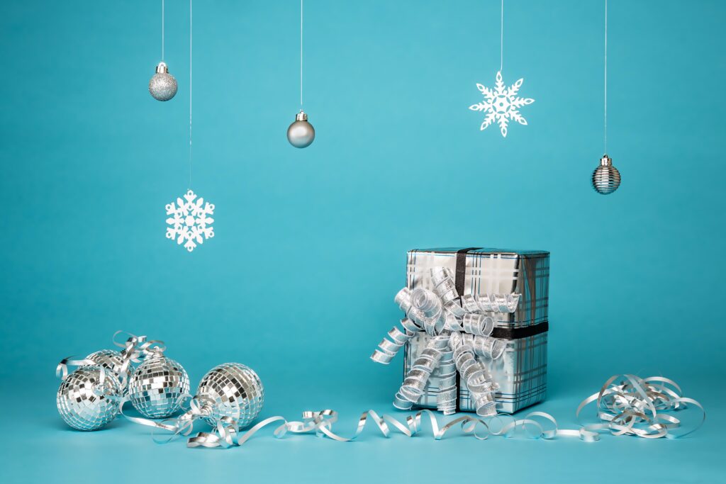 Wrapped Christmas gifts over a blue background