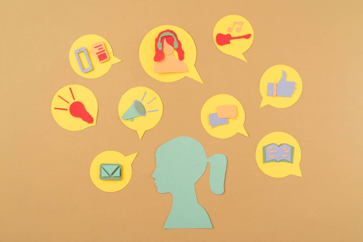 Various online interests and activities of a person, presented as icons around her