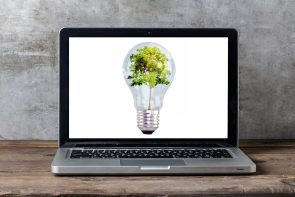 Laptop with an eco-friendly idea light bulb