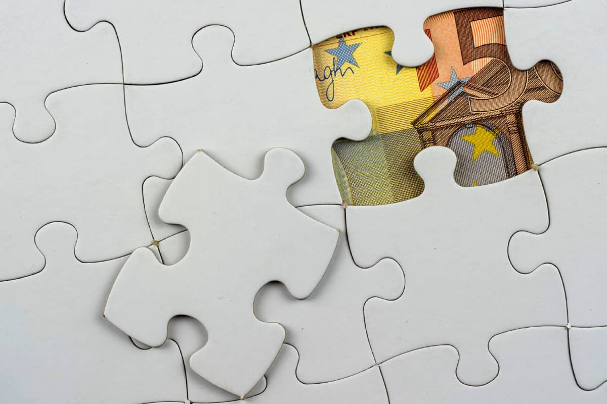 Money under a missing puzzle piece