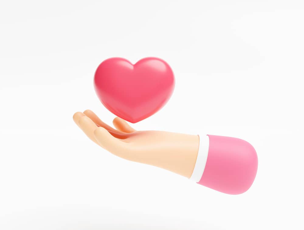 Transactional emails - Hand holding heart icon symbolizing customer service