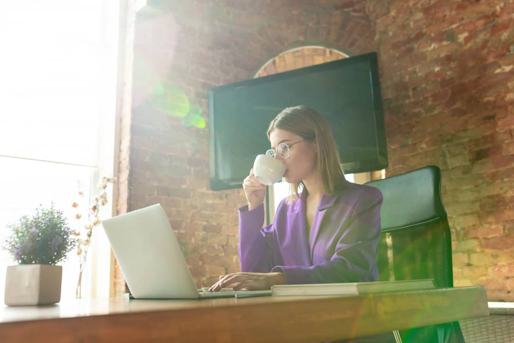 Email marketer working in a modern office