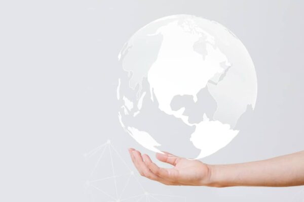 Holding Globe, Symbolizing Appealing to International Audiences with Email Marketing