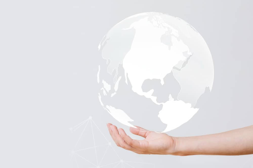 Holding Globe, Symbolizing Appealing to International Audiences with Email Marketing