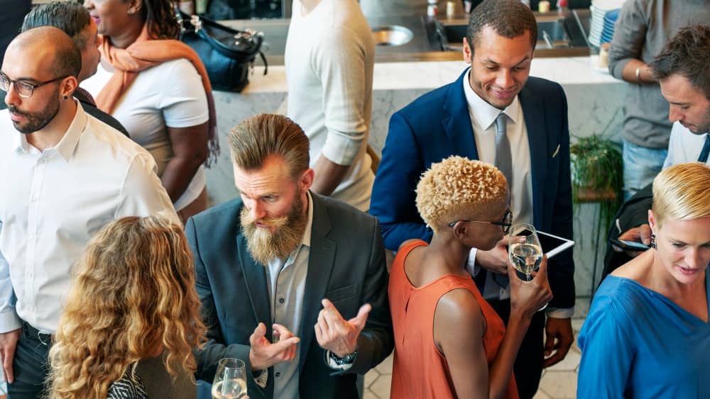 Diverse business people networking at an event