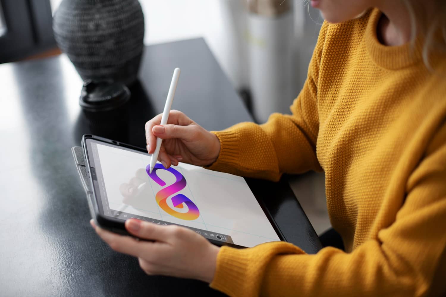 Logo designer working on a graphic tablet