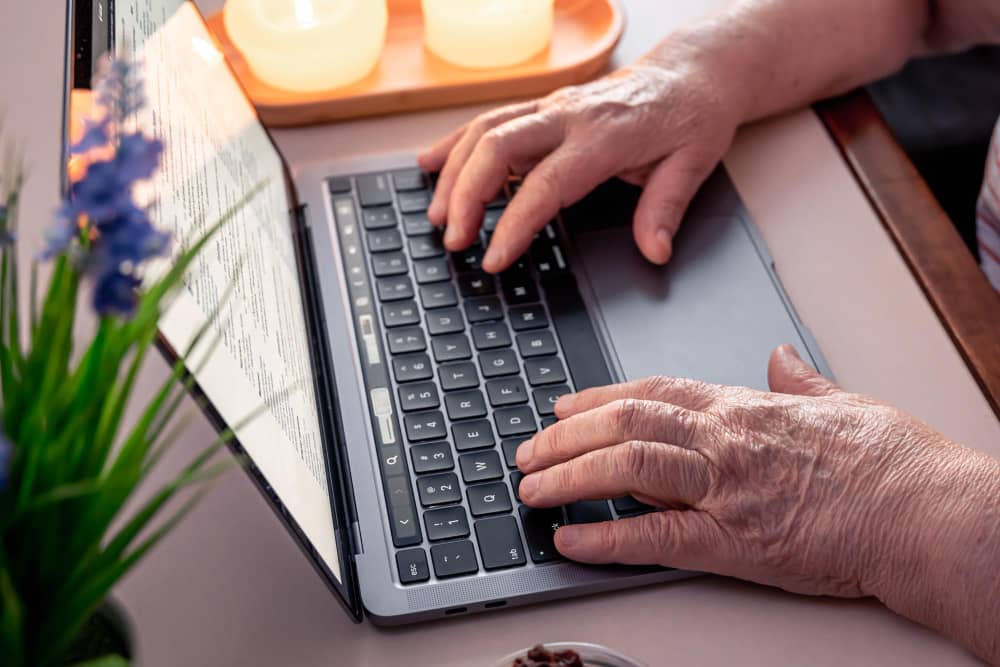 Older person using a laptop