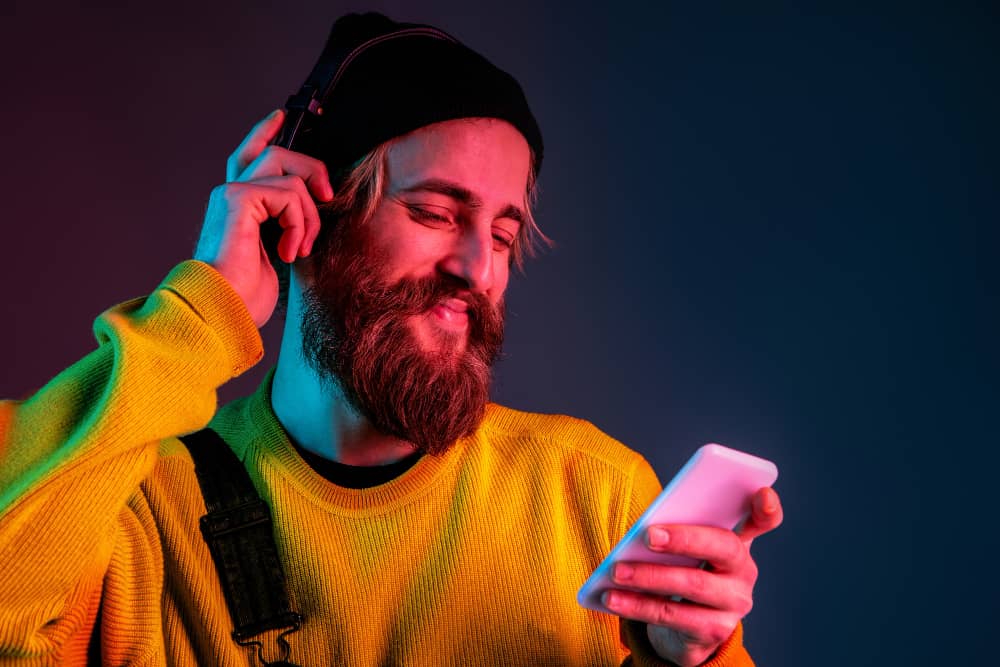 A person looking at their phone, reading a promising marketing email