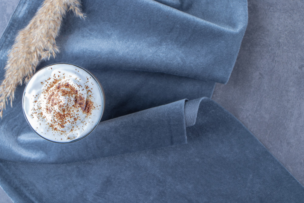 Mocha drink on a pastel blue cloth