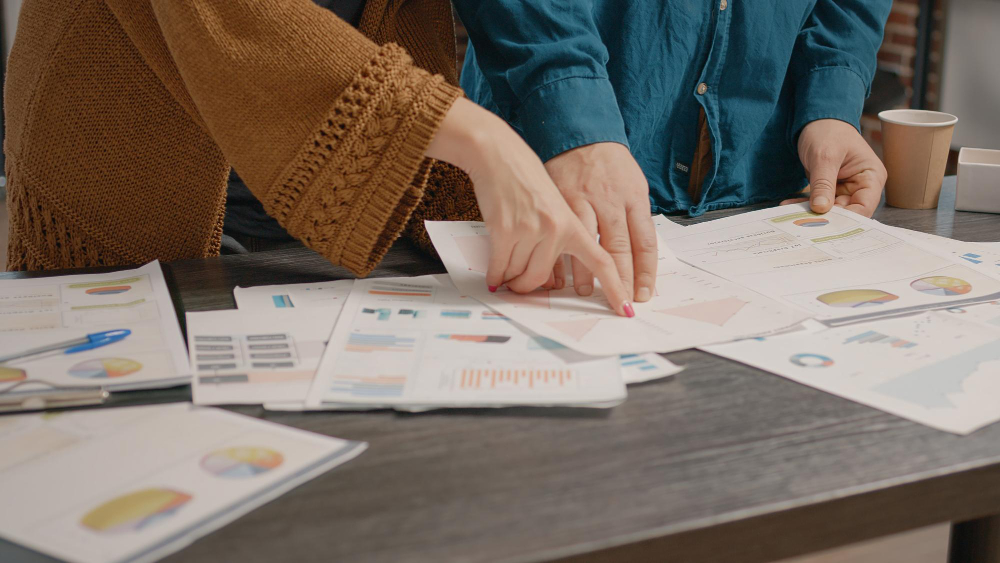 Colleagues analyzing marketing data