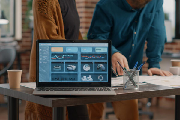 Marketers analyzing website data, symbolizing Boost website with email marketing analytics