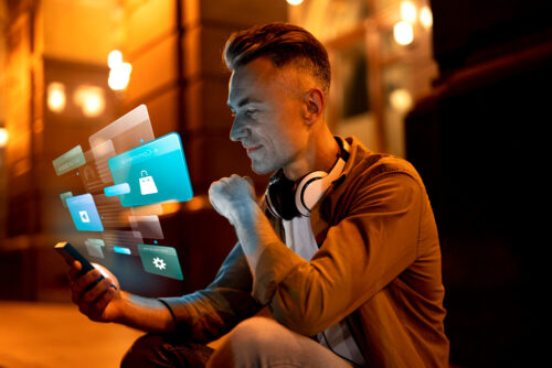 Man looking at mobile with images hovering over it, showing different product categories