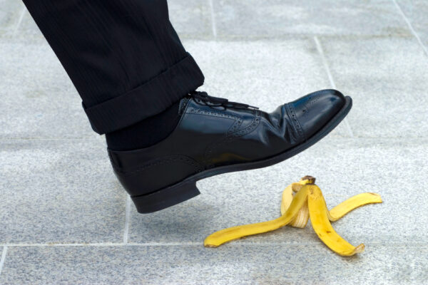 Person about to step on a banana peel, symbolizing bad landing pages